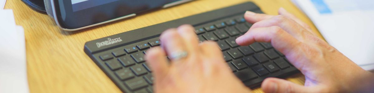 Typing on a keyboard.