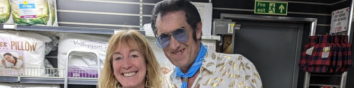 Kate and Elvis impersonator in the famous NE shop, The Spotty Bag Shop